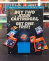 Buy Two Atari Cartridges, Get One Free! Dealer Displays